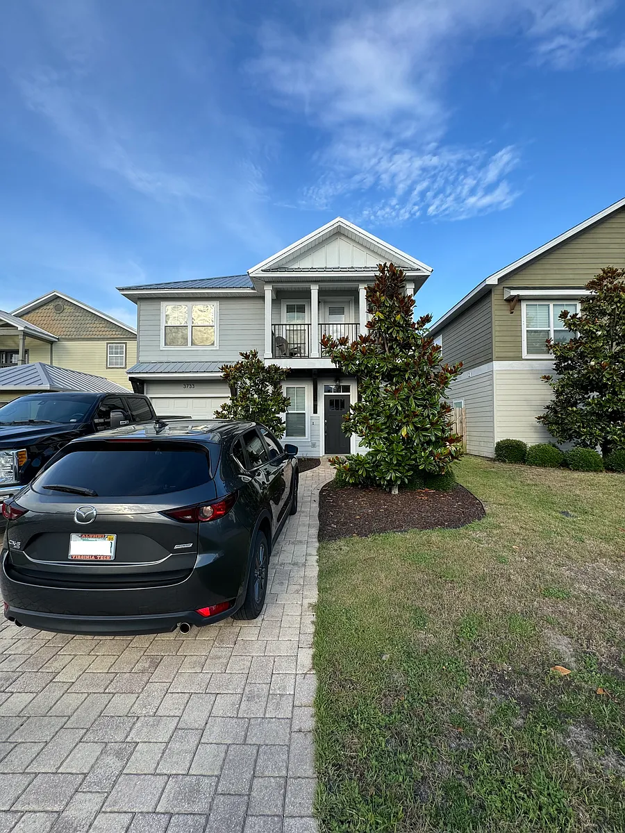 Outside view of the home. 2 car driveway - 3733 Tiki Dr