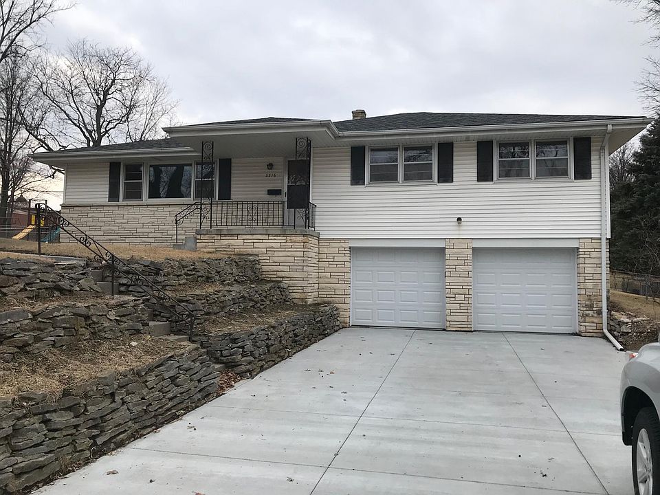 Raise Ranch with large garage *(garage-22' wide x 28' deep)