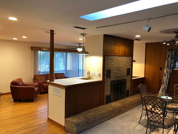 Kitchen opens to living and dinning area