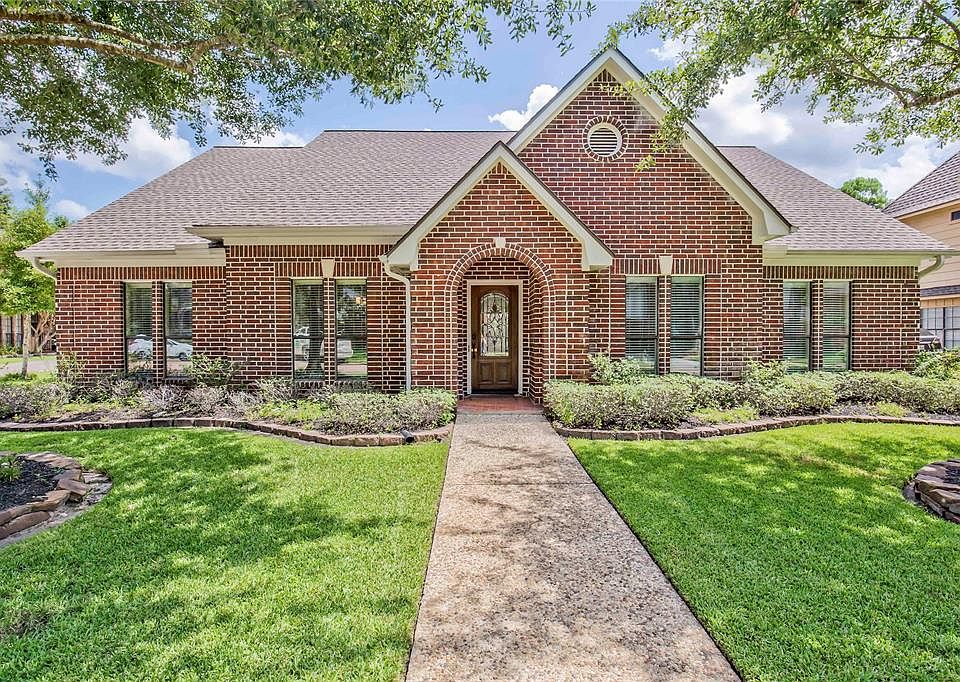 WELCOME to 17822 Windtree Lane! This full brick, cul-de-sac home is full of energy saving features... tankless hot water heater, water filter system and recent AC, heater, roof & duct work.