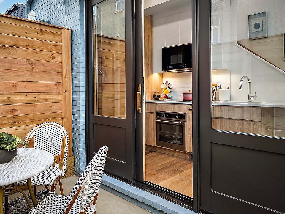 Enter the home through the gated patio.