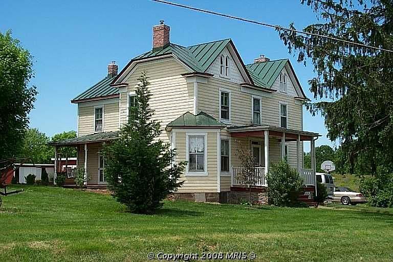 True Home Photo--listing one is 10 years old from previous owner