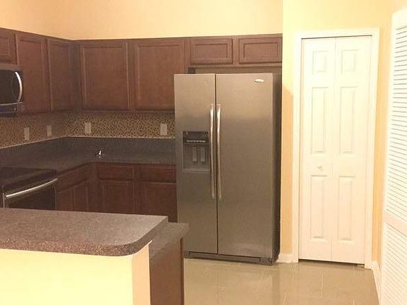 4th image of 6915 Ortega Woods Dr #32
