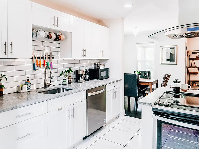 Relax in Denver in your Sunnyside oasis. Welcoming open floor plan. Fully stocked kitchen, dining room, breakfast bar, living room, outdoor living.