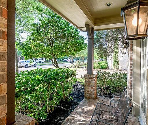 A charming front porch is the perfect spot to sit and have a cool beverage on hot summer's night and a place to visit with neighbors as they pass by on an evening stroll!