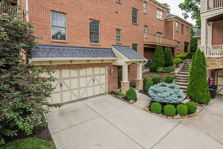 Private entrance with large 2 car garage that includes 10 foot ceilings. This unit is part of the Private, Grandestone Condominium Association. 7 Total Units.
