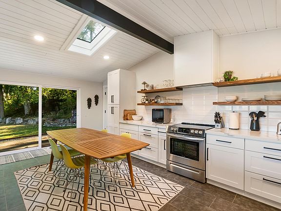 Kitchen also opens to backyard