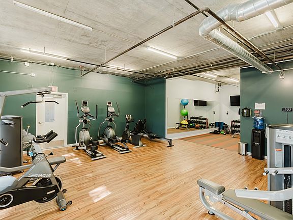 Fitness Center with Free-Weights and Pilates Area