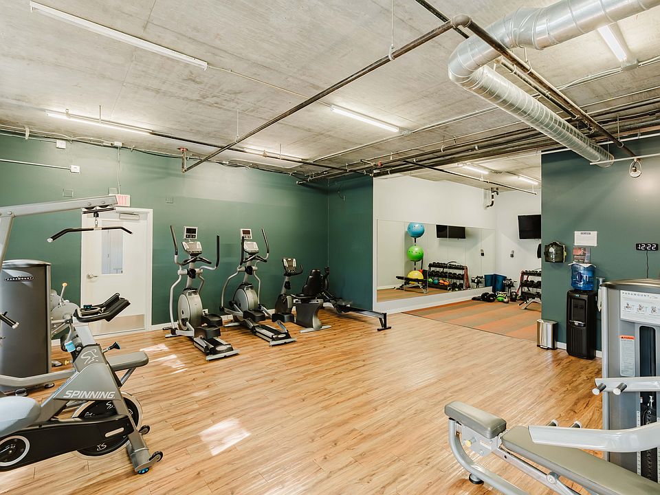 Fitness Center with Free-Weights and Pilates Area
