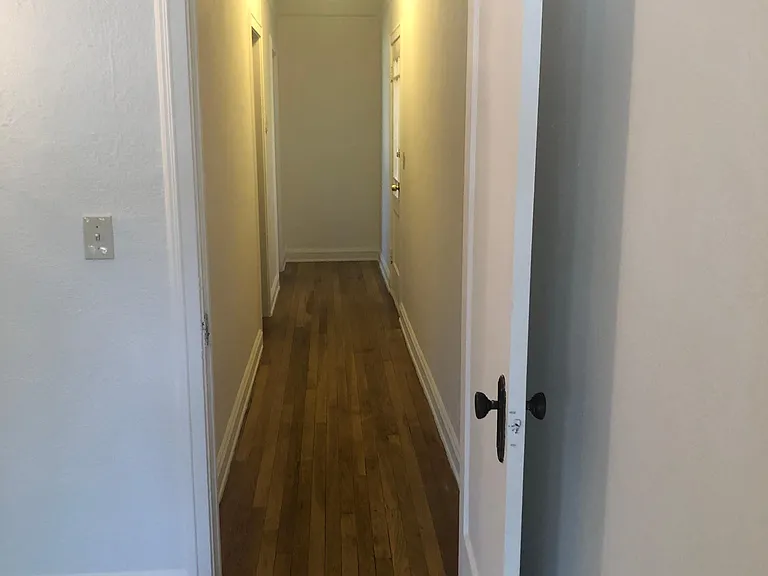 Hallway with front door closed