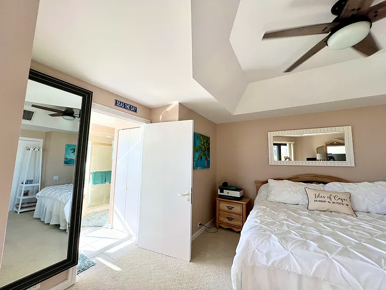 Master bedroom with adjustable king bed & TV