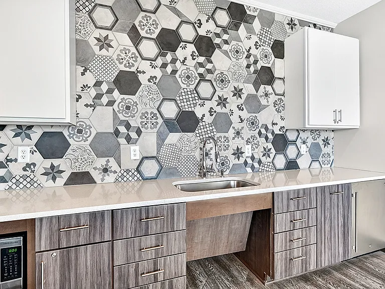 Refresh with your favorite drink at our stylish beverage bar, featuring modern finishes and a welcoming space to recharge.