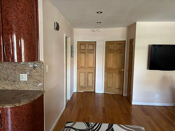 Open Concept - Living and Hallway wtih closet