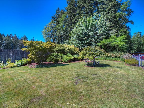 Yard is fully fenced and gated. >