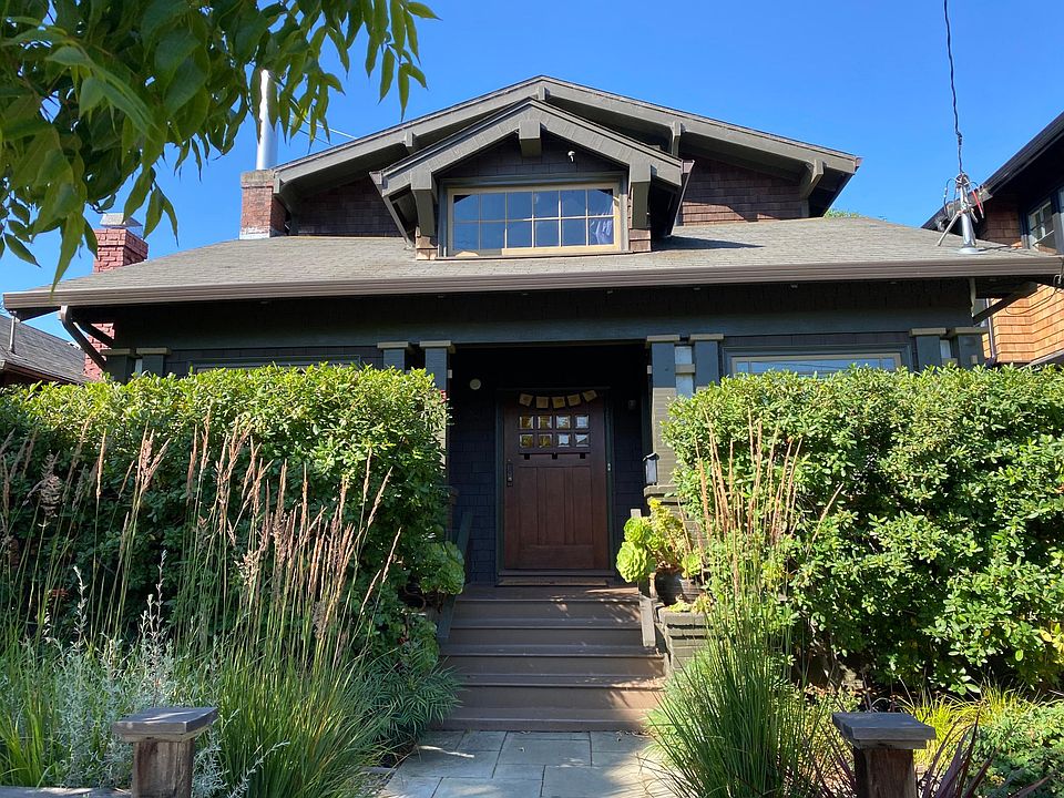 Front of House, entrance to unit on right side of porch