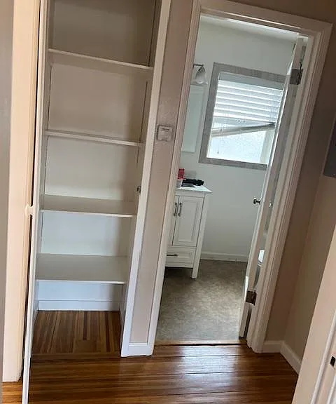 Hall to bathroom and linen closet