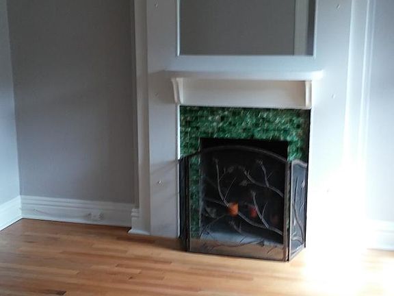 Living room or possible dining room fireplace. This is at the front of the duplex.