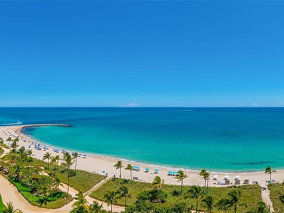 Panoramic northeast views of Atlantic Ocean and Intracoastal Inlet from terrace.