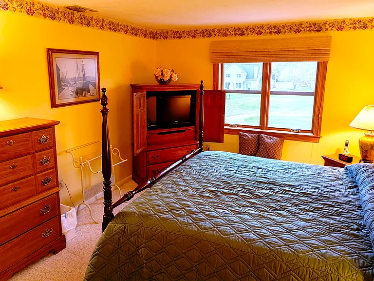 master bedroom TV armoire, flat-screen TV with DVR & voice control Verizon More FIOS 2.0 television service