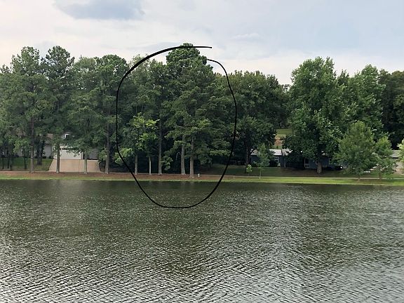 View of lot from across lake