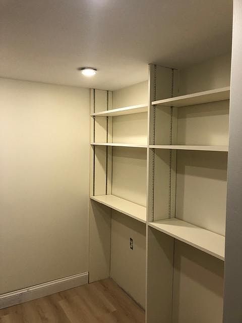 Large Pantry Area With Plenty Of Shelving And Storage Space For Your Kitchen Gadgets!