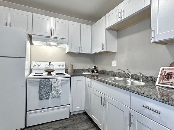 Upgrade your cooking experience in select units with sleek granite countertops and functional kitchen layouts.