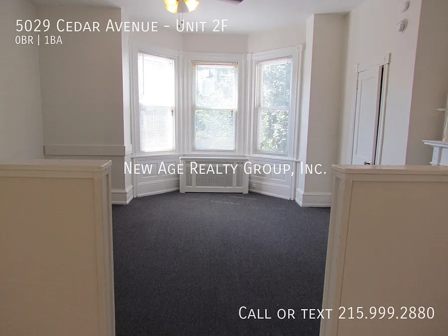 Building Photo - 5029 Cedar Ave #2F