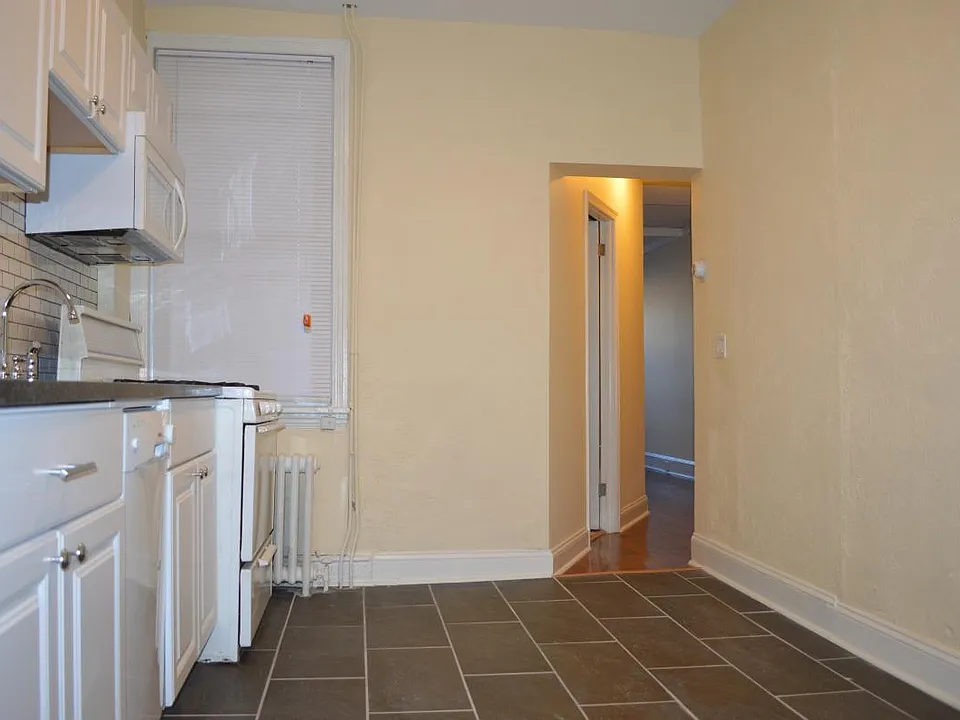 Kitchen and entrance to bedroom. Bathroom is to the left.