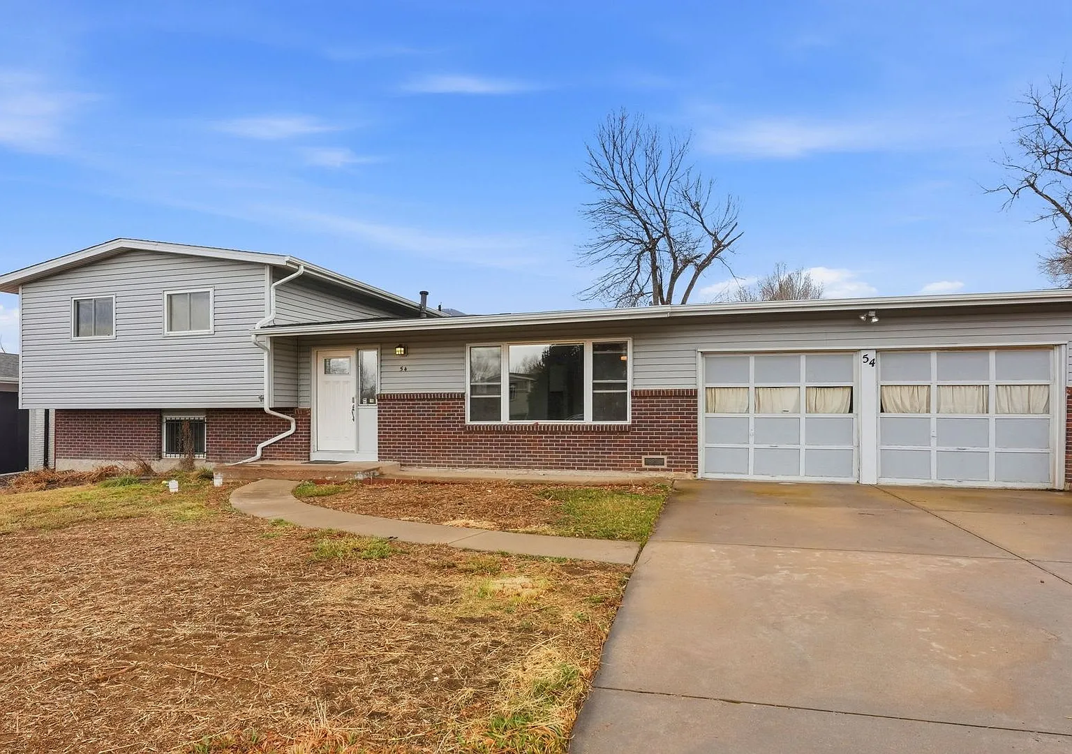 Updated 4BR Home with 2-Car Garage in Stratmoor — Photo 1