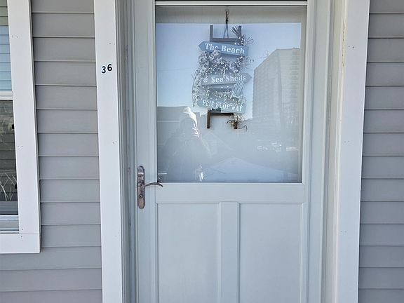 2nd image of 9315 Atlantic Ave APT 36