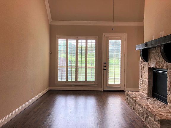 Downstairs living looks onto patio