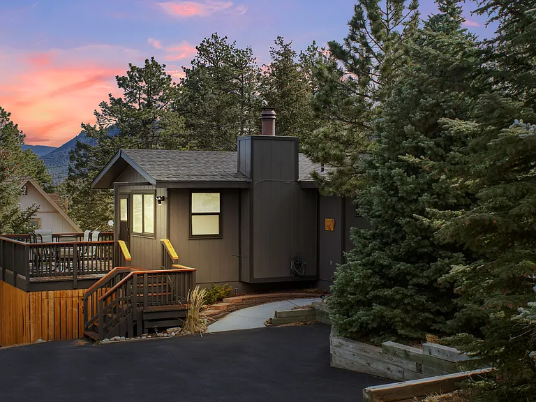 Exterior of the home, front deck, and driveway.