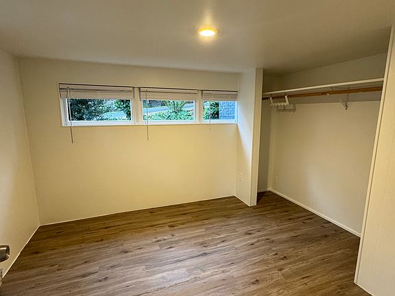 Spacious bedroom with newly added flooring