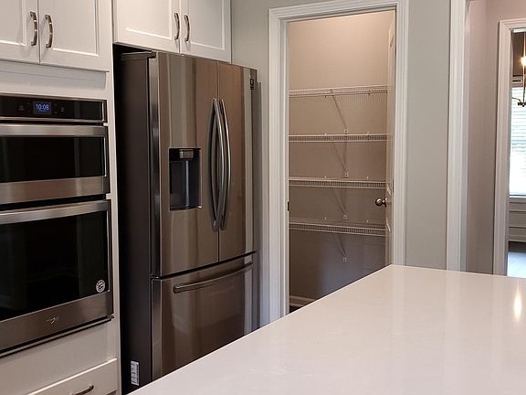 Walk in pantry and butler's nook leading to formal dining