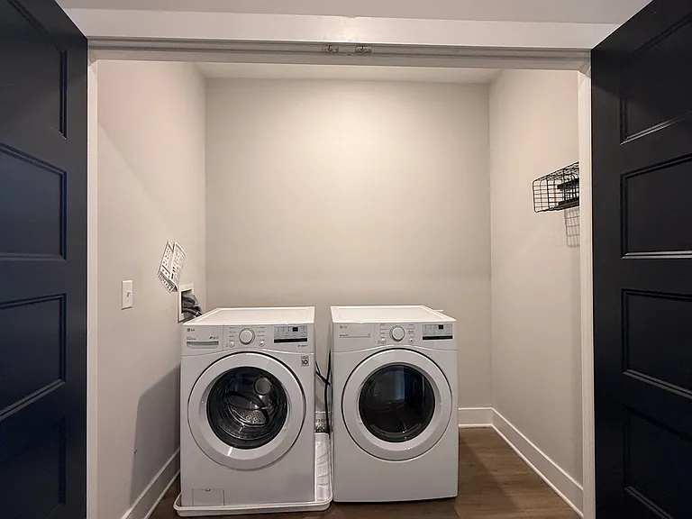 In-unit washer and dryer and wash room on second floor