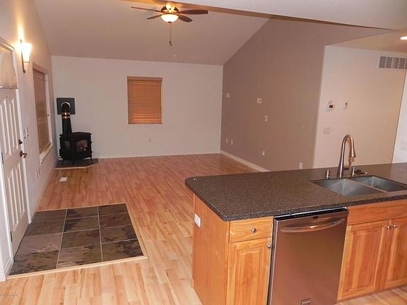 Cozy natural gas "woodstove", laminate wood floors