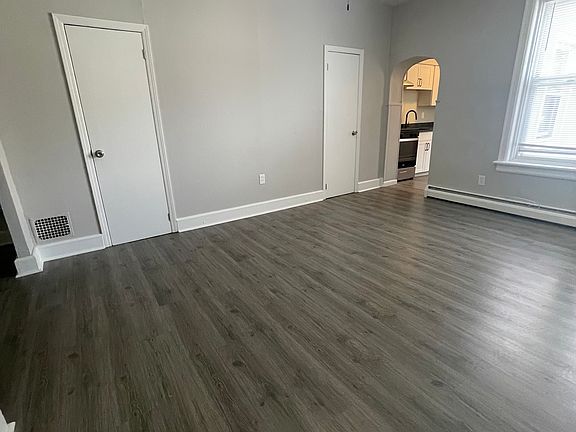 Full wall of storage area behind doors