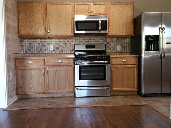 Lots of work space and cabinents. Refrigerator with water and ice maker. Gas stove and oven.