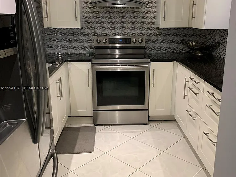 501 Three Islands Blvd #108 — Photo 1