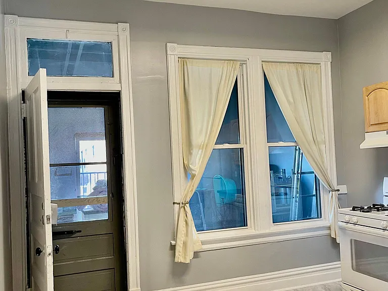 Kitchen with back door open