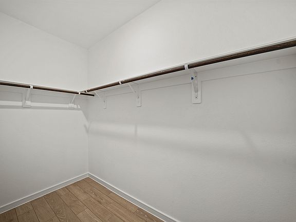 Primary Suite Walk-In Closet