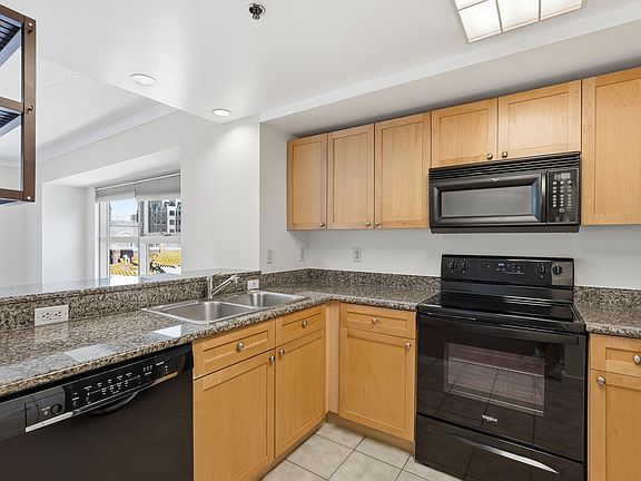 Modern Kitchen with Stainless Steel Appliances and Ample Cabinetry