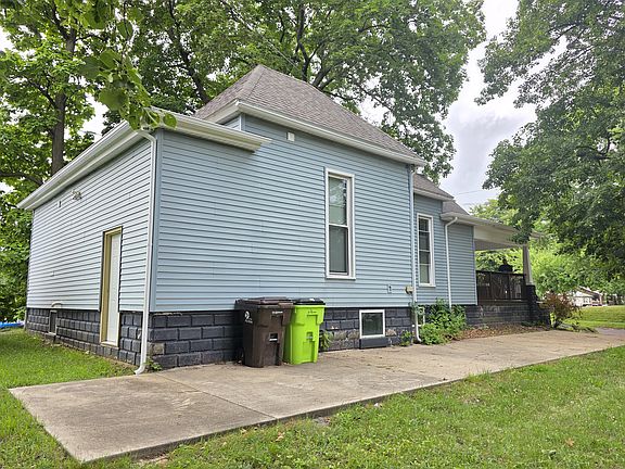 Side and back of the home. All new concrete and great off street parking