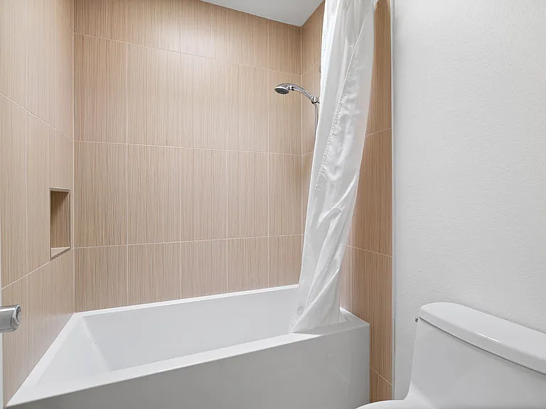 GUEST BEDROOM SUITE SHOWER OVER TUB