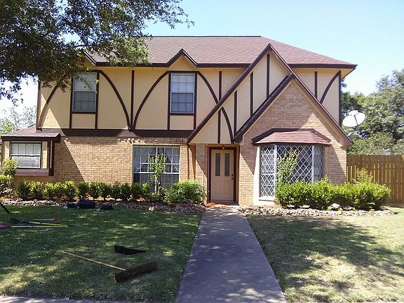 FRONT OF HOUSE W/O TREES NOW