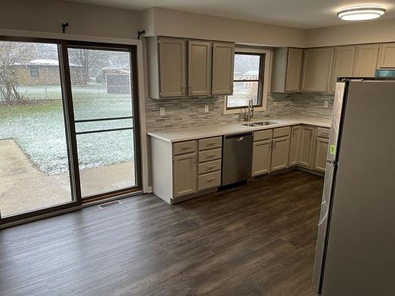 kitchen - patio door to fenced yard
