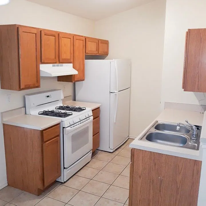 Bright and open kitchen opens into the dining area and open living room.