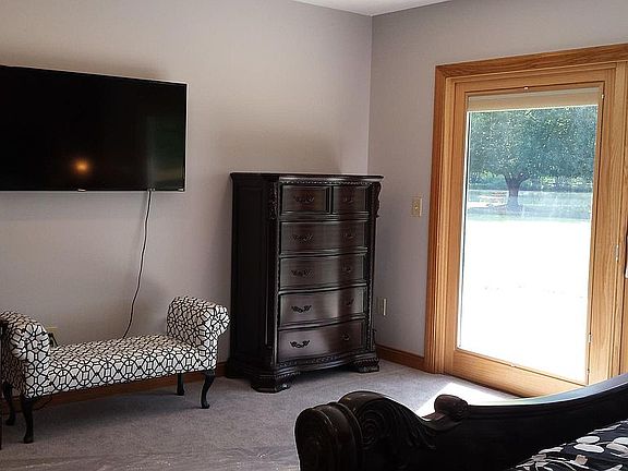 Master Bedroom with Beautiful View of Lake and Trees upon waking, 50" HD TV