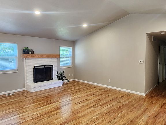 All hardwood floors are freshly refinished and walls painted.