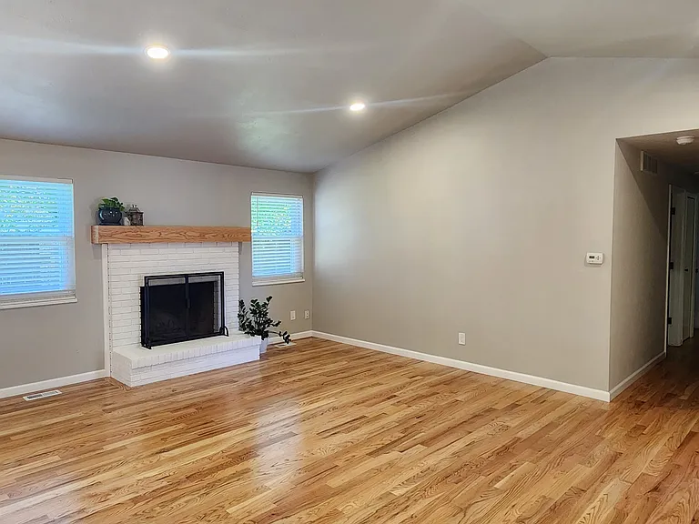 All hardwood floors are freshly refinished and walls painted.
